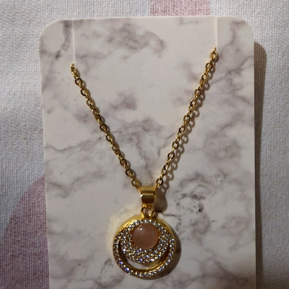 Pendant Necklace with Crystal Accents And Pink Quartz